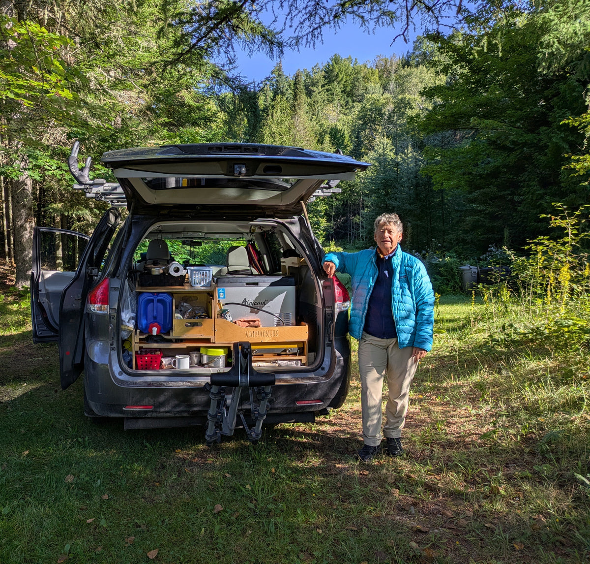 Woman traveling alone in a Vanpackers minivan